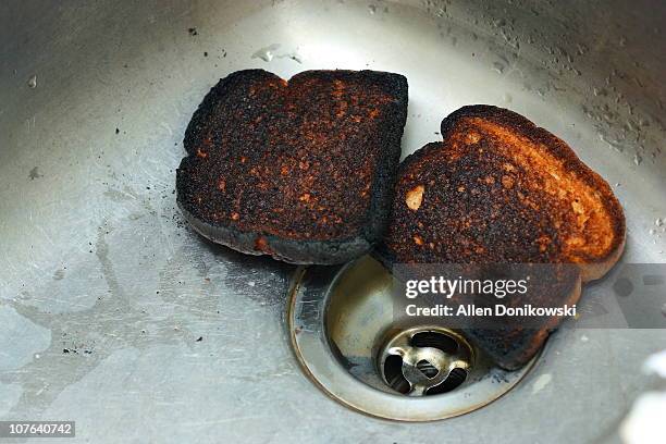 failed breakfast - burnt bread stock pictures, royalty-free photos & images