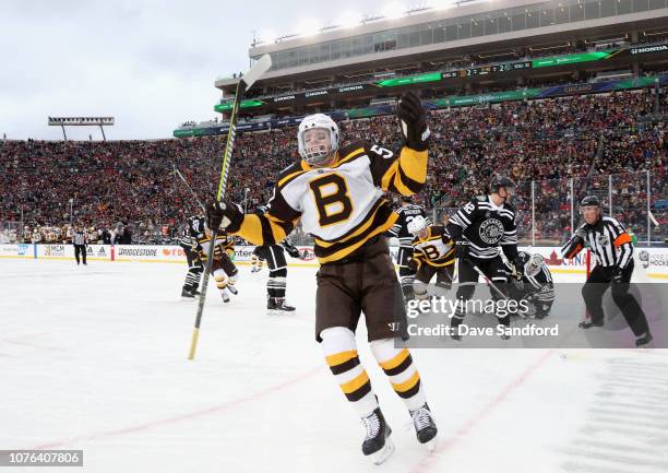 Sean Kuraly of the Boston Bruins celebrates his go ahead goal to make it 3-2 against the Chicago Blackhawks during the third period of the 2019...