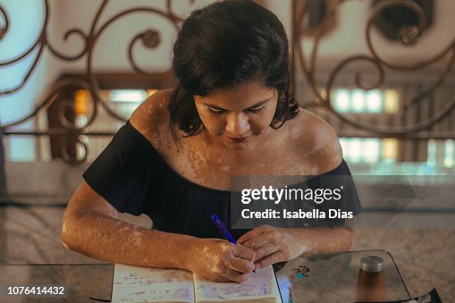 Woman Rocks Writing Woman Writing High-Res Stock Photo - Getty Images