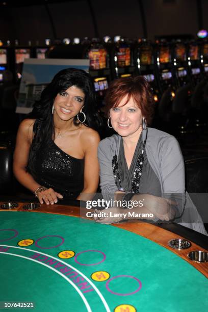 Personalities Teresa Giudice and Caroline Manzo play Black Jack at the Site casino held at at Seminole Casino Coconut Creek on December 16, 2010 in...