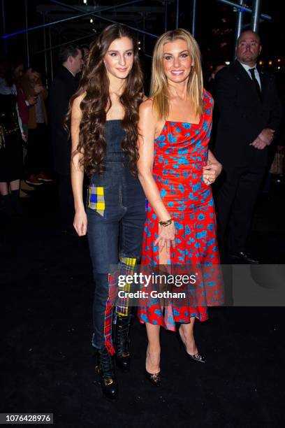Audrey Caroline McGraw and Faith Hill attend the Versace Pre-Fall 2019 Runway Show at the American Stock Exchange in the Financial District on...