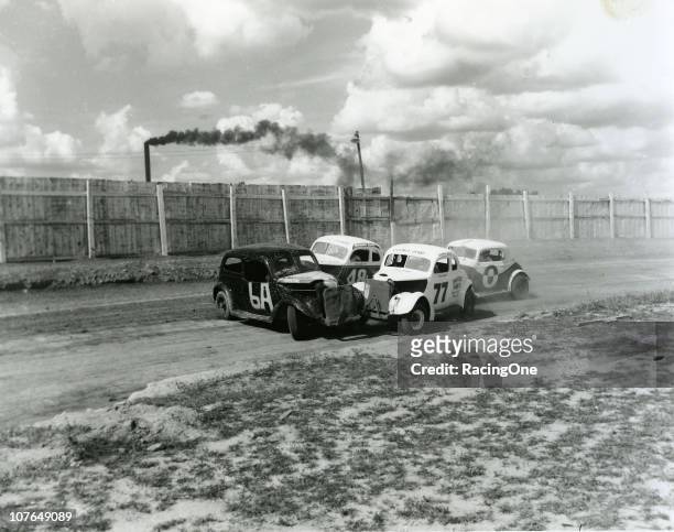 Shorty York gets sideways in front of Ted Swain and others during a 1950s Modified race at the Greensboro Fairgrounds.