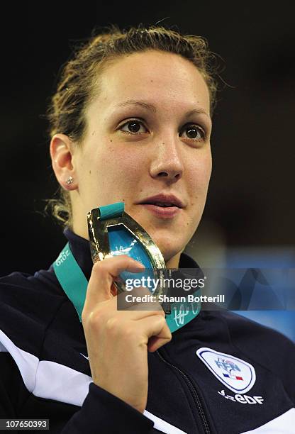 Alexianne Castel of France wins the gold medal in the final of the Women's 200m Backstroke during the 10th FINA World Swimming Championships at the...