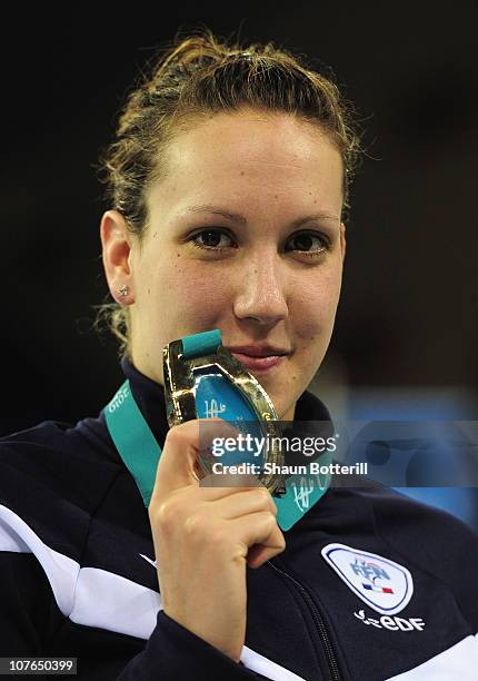 Alexianne Castel of France wins the gold medal in the final of the Women's 200m Backstroke during the 10th FINA World Swimming Championships at the...