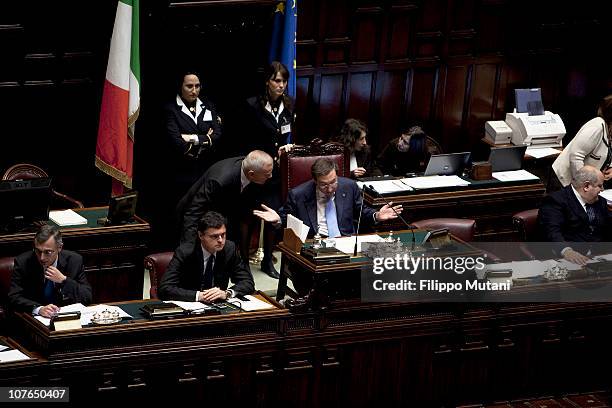 Italian Lower House President Gianfranco Fini, talking to Government member Gianni Letta, during a session on the vote of confidence to Berlusconi's...