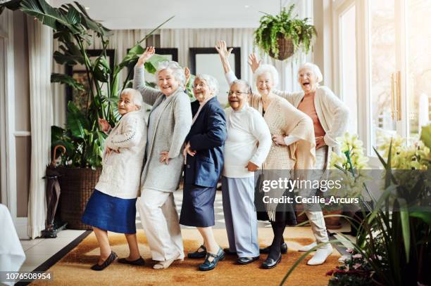 we found the fountain of youth…it’s called having fun! - active seniors group stock pictures, royalty-free photos & images