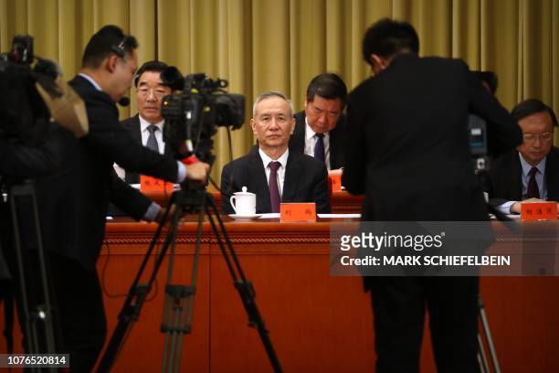 China's Vice Premier Liu He attends an event to commemorate the 40th anniversary of the Message to Compatriots in Taiwan at the Great Hall of the...