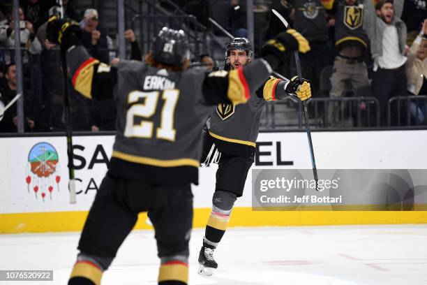 Brandon Pirri of the Vegas Golden Knights celebrates with teammate Cody Eakin after scoring a goal against the Los Angeles Kings during a game at...