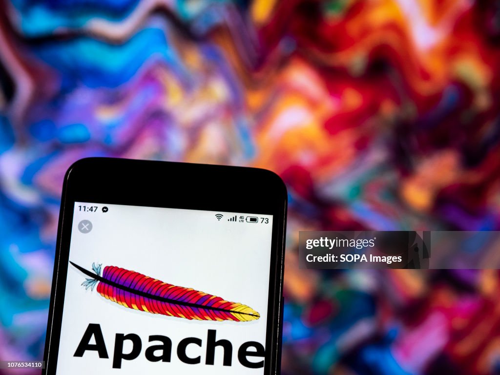 In this photo illustration, the Apache HTTP Server Software logo seen ...