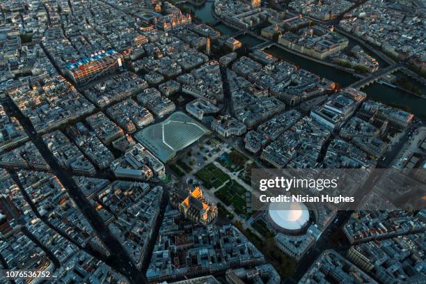 aerial flying over les halles shopping area in paris france, sunset - paris sport stock pictures, royalty-free photos & images