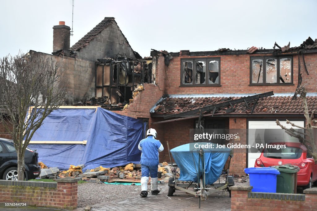 Police launch murder inquiry after three die in house fire