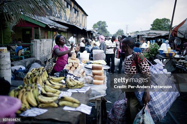 Unidentified people at an evening street market on November 3, 2010 in the Gombe district in central Kinshasa, Congo, DRC. Kinshasa, a city of about...