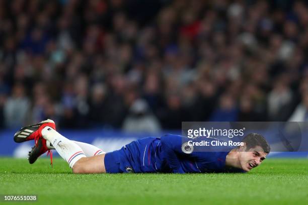 Alvaro Morata of Chelsea goes down injured during the Premier League match between Chelsea FC and Southampton FC at Stamford Bridge on January 2,...