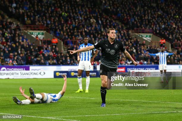 Chris Wood of Burnley celebrates after scoring his sides first goal during the Premier League match between Huddersfield Town and Burnley FC at John...