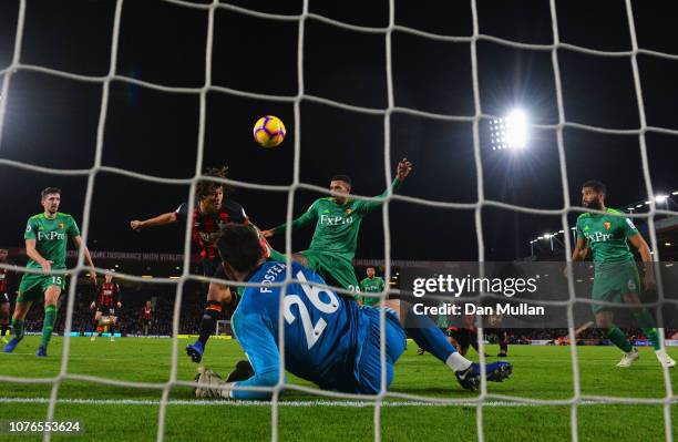 Nathan Ake of AFC Bournemouth scores his team's first goal past Ben Foster of Watford during the Premier League match between AFC Bournemouth and...