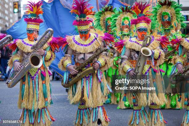 Members of the Woodland string band participate in the Philadelphia Mummers Parade, a New Years Day tradition. Hundreds of performers, comics and...