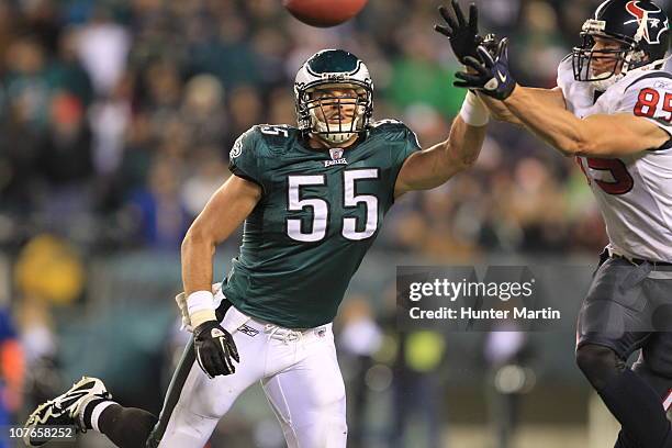 Linebacker Stewart Bradley of the Philadelphia Eagles covers tight end Joel Dreessen of the Houston Texans during a game at Lincoln Financial Field...