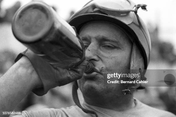 Juan Manuel Fangio, Grand Prix of Great Britain, Silverstone Circuit, 14 July 1956. Juan Manuel Fangio after his victory in the 1956 British Grand...