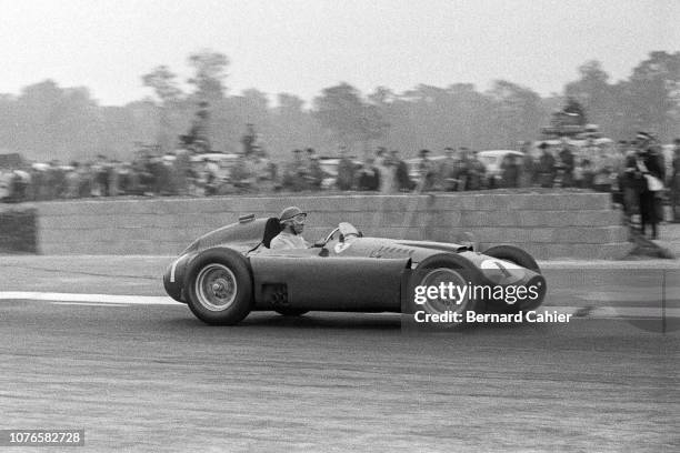 Juan Manuel Fangio, Ferrari D50, Grand Prix of Great Britain, Silverstone Circuit, 14 July 1956. Juan Manuel Fangio on the way to victory in the 1956...