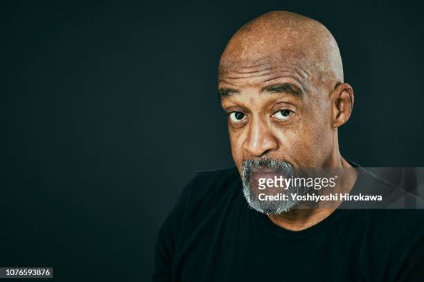 portrait of attractive senior african american. - goatee stock pictures, royalty-free photos & images