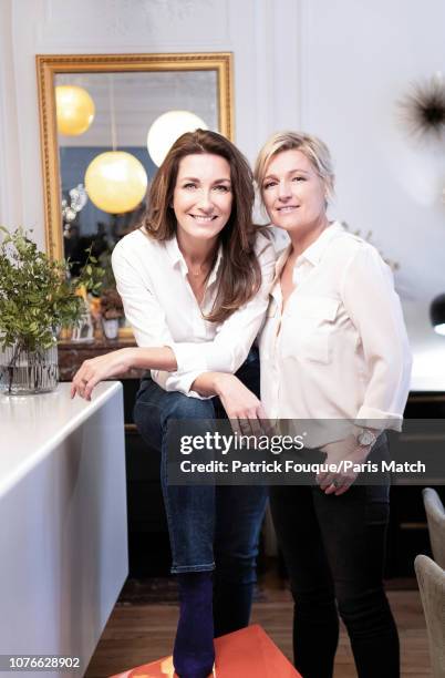 Journalists Anne-Claire Coudray and Anne-Elisabeth Lemoine are photographed for Paris Match on December 21, 2018 in Paris, France.