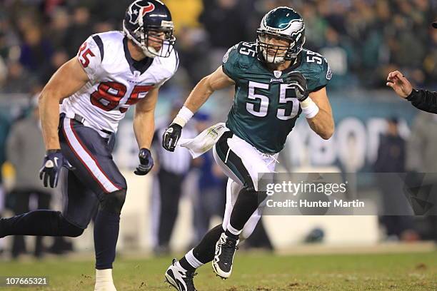 Linebacker Stewart Bradley of the Philadelphia Eagles covers tight end Joel Dreessen of the Houston Texans during a game at Lincoln Financial Field...