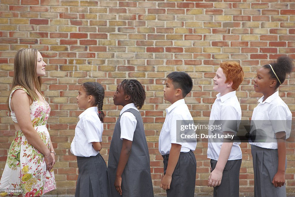 School Children Lining Up High Res Stock Photo Getty Images school-children-lining-up-high-res-stock-photo-getty-images