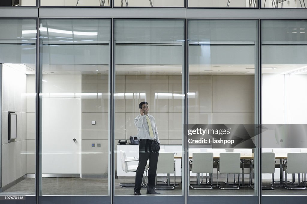 Business man using mobile phone