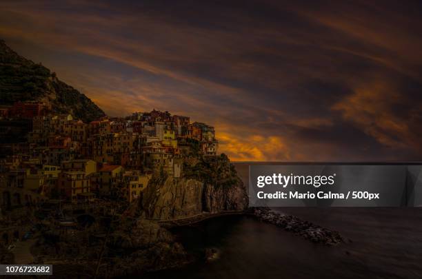 manarola sunset - mario calma stockfoto's en -beelden