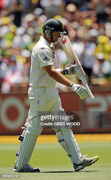 Australian batsman Shane Watson leaves the ground after being given out LBW after a third umpire review decision on day three of the third Ashes...