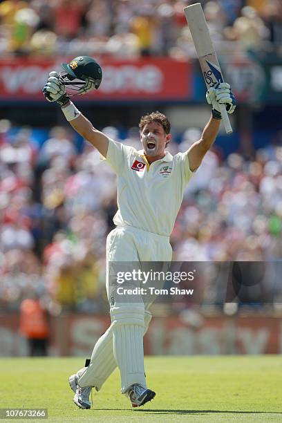 Michael Hussey of Australia celebrates reaching his century during day three of the Third Ashes Test match between Australia and England at the WACA...