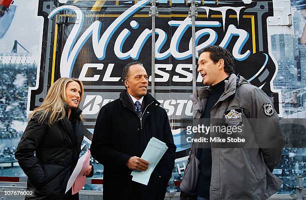 Hosts Lester Holt and Amy Robach, along with former NHL player Brendan Shanahan, film a segment of the "Today" show durng the NHL Winter Classic...