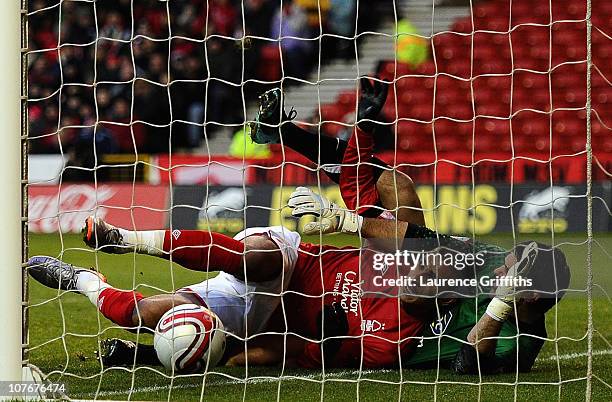 Marcus Tudgay of Nottingham Forest battles with goalkeeper Julian Speroni of Crystal Palace during the npower Championship match between Nottingham...