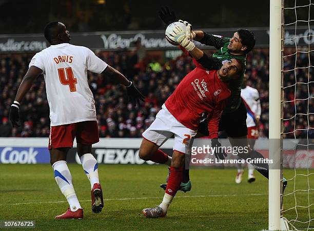Marcus Tudgay of Nottingham Forest battles with Julian Speroni of Crystal Palace during the npower Championship match between Nottingham Forest and...