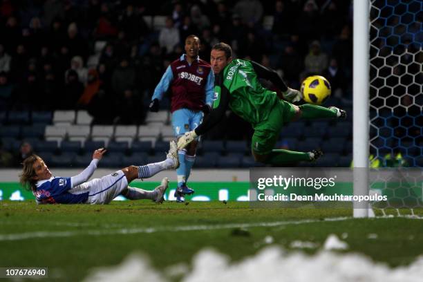 Goalkeeper Paul Robinson of Blackburn can not save the shotand goal by Junior Stanislas of West Ham during the Barclays Premier League match between...