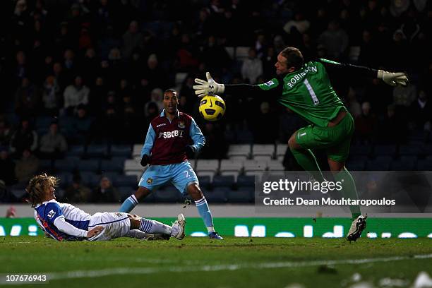 Goalkeeper Paul Robinson of Blackburn can not save the shotand goal by Junior Stanislas of West Ham during the Barclays Premier League match between...