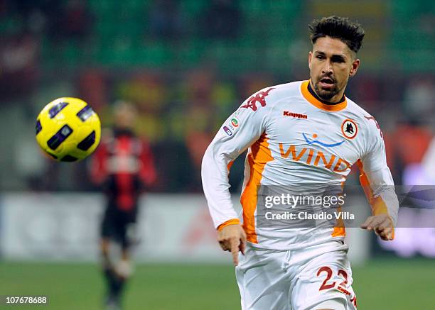 Marco Borriello of AS Roma in action during the Serie A match between AC Milan and AS Roma at Stadio Giuseppe Meazza on December 18, 2010 in Milan,...