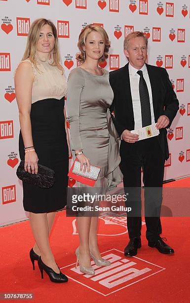 Television talk show host Johannes B. Kerner, his wife Britta Becker-Kerner and Stephanie zu Guttenberg attend the 'Ein Herz Fuer Kinder' charity...