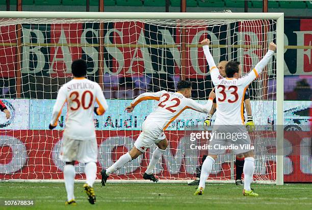 Marco Borriello of AS Roma celebrates scoring the first goal during the Serie A match between AC Milan and AS Roma at Stadio Giuseppe Meazza on...