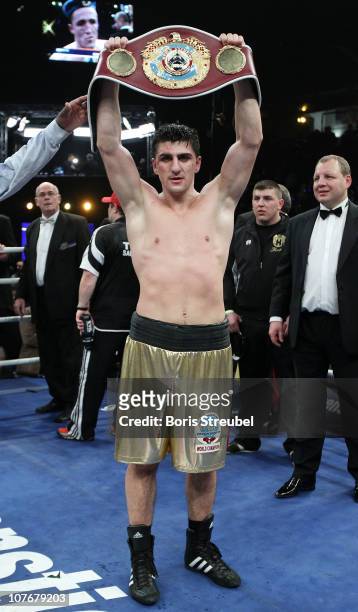 Marco Huck of Germany celebrates defending the WBO World Championship title after his WBO World Championship Cruiserweight title fight against Denis...