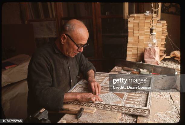 Craftsman Making Inlaid Backgammon Board