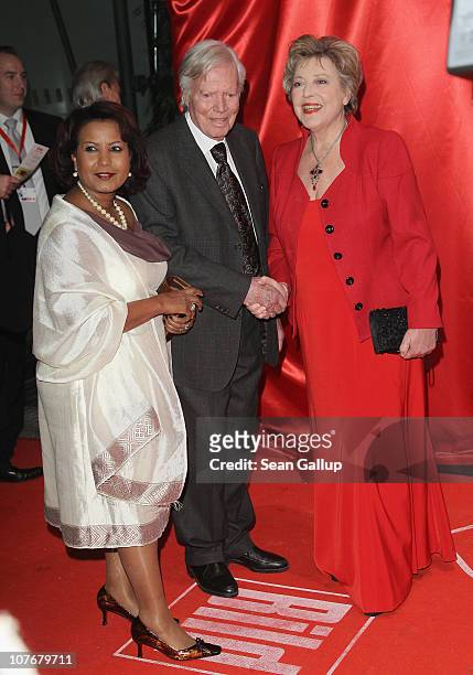 Karlheinz Boehm, his wife Almaz Boehm and actress Marie-Luise Marjan attend the 'Ein Herz Fuer Kinder' charity gala at Axel Springer Haus on December...