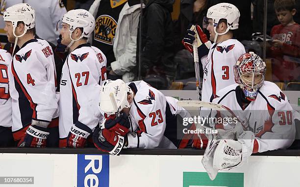 John Erskine,Karl Alzner,Scott Hannan,Tom Poti and Michal Neuvirth of the Washington Captials watch the last seconds of the game against the Boston...