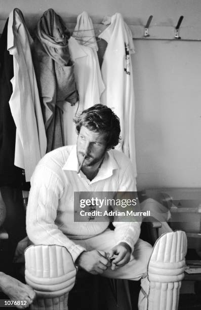 Ian Botham of England smokes a cigar in the changing room after his match-winning 149 not out during the third Test Match against Australia at...
