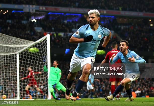 Sergio Aguero of Manchester City celebrates after scoring his team's first goal during the Premier League match between Manchester City and Liverpool...