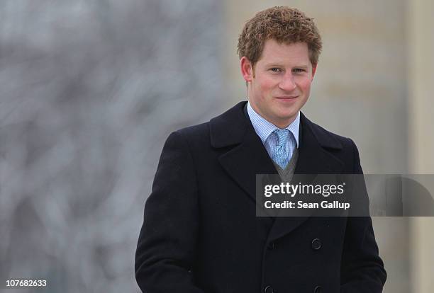 Prince Harry walks on Pariser Platz while visiting the Brandenburg Gate on December 19, 2010 in Berlin, Germany. Prince Harry is on a two-day trip to...