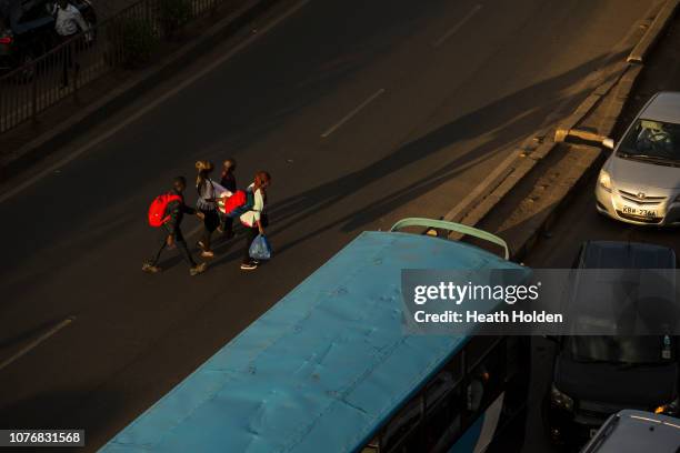 Stranded commuters are forced to walk for hours to make their public transport connection on opposite sides of the city after the Kenyan government...