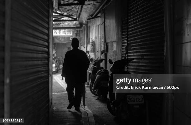 dark alley at snake alley - snake alley stock pictures, royalty-free photos & images