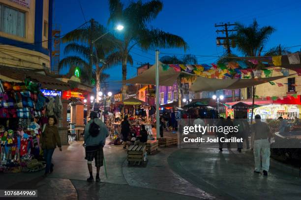 tijuana, mexico tourist area at night - tijuana-shopping stock pictures, royalty-free photos & images