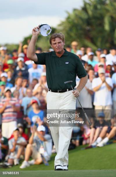 Ernie Els of South Africa celebrates after his final putt on the 18th green to win the South African Open Golf Championship at the Durban Country...